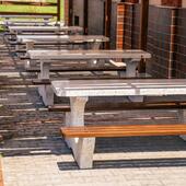Outdoor tables with benches for outdoor cafes